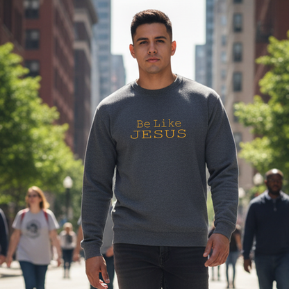 Man wearing a gray sweatshirt with 'Be Like Jesus' text on a city street.
