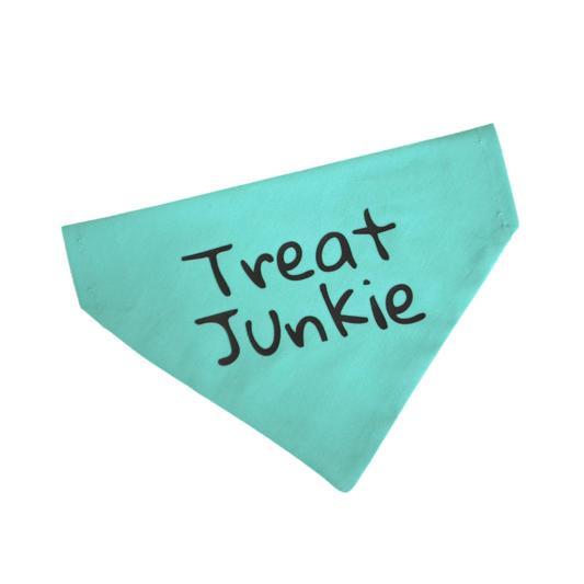 Turquoise like color bandana with 'Treat Junkie' text on a white background